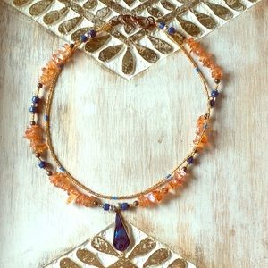 Abalone shell pendant with translucent orange